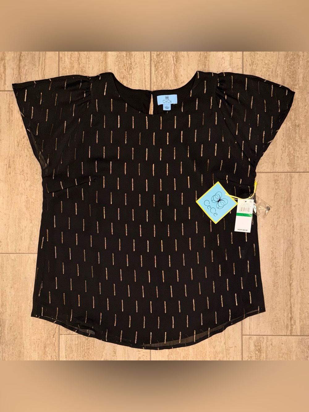 NWT Cece Woman Chiffon Blouse
Black/gold Strips Lined Fluffy Size Large
